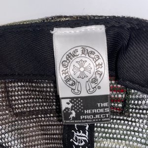 Chrome Hearts x The Heroes Project Camo Trucker Hat