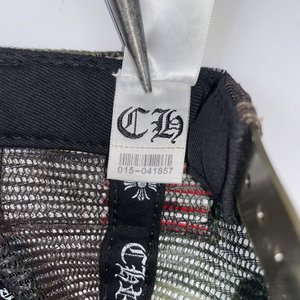 Chrome Hearts x The Heroes Project Camo Trucker Hat