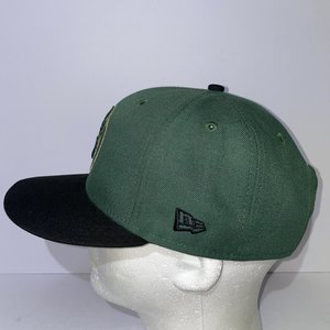 New Era 9Fifty Wisconsin Herd Green Snapback Cap