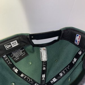 New Era 9Fifty Wisconsin Herd Green Snapback Cap