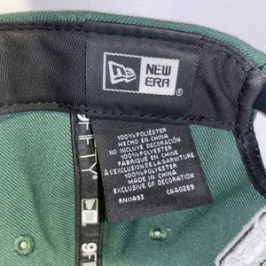 New Era 9Fifty Wisconsin Herd Green Snapback Cap